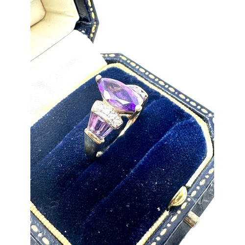 278 - 9ct gold diamond & amethyst dress ring (2.4g)