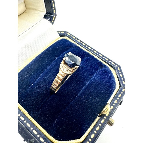 263 - 9ct gold sapphire single stone ring with diamond accents (1.9g)