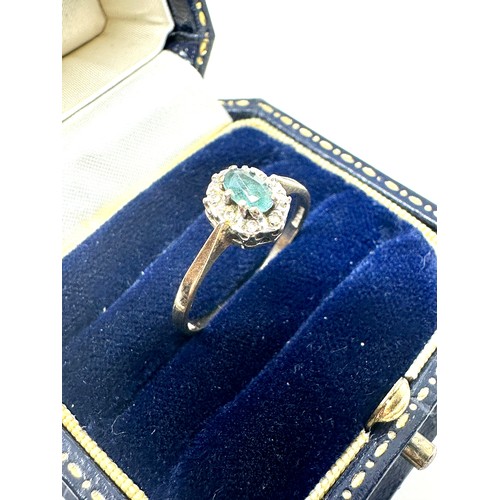 109 - 9ct gold diamond & aquamarine halo ring (1.4g)