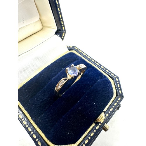110 - 9ct gold tanzanite single stone ring with diamond set shank (1.4g)