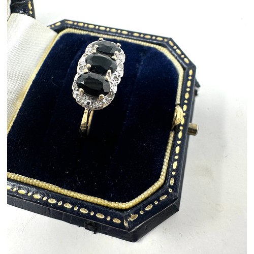 202 - 9ct gold diamond & sapphire dress ring (2.5g)