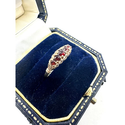 199 - 9ct gold garnet ring (1.3g)