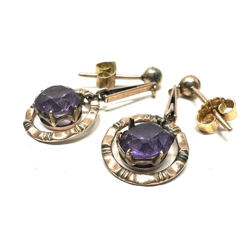 180 - 9ct gold  synthetic colour changing sapphire drop earrings (2.6g)