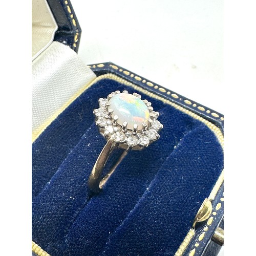 174 - 9ct gold vintage opal & diamond halo dress ring (3.4g)