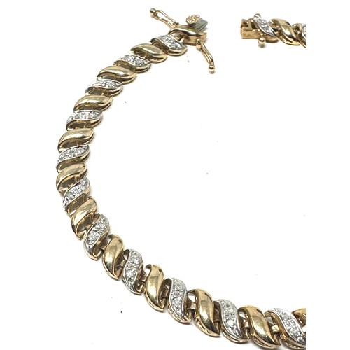 123 - 9ct gold diamond tennis bracelet (7.6g)