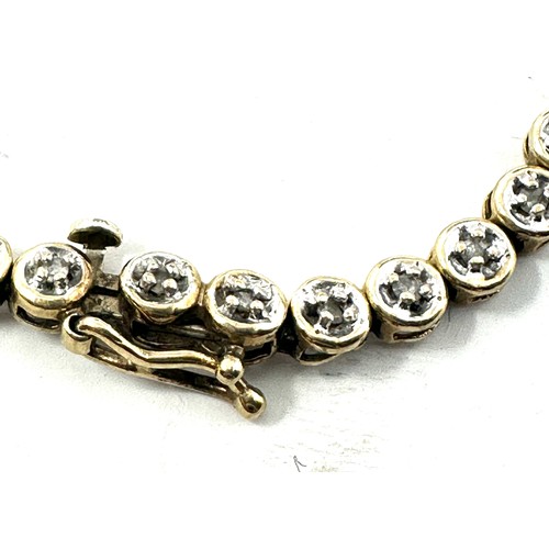 122 - 9ct gold diamond tennis bracelet (5.8g)