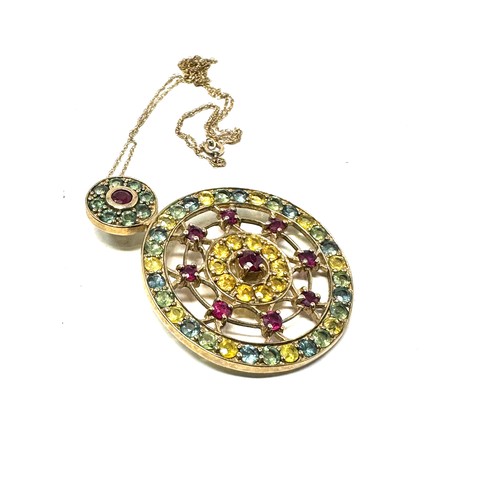 250 - 9ct gold ruby & vari-hue sapphire round pendant necklace (9.2g)