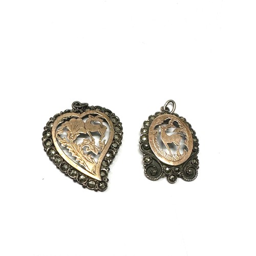 99 - 2 gold & silver antique marcasite set deer motif pendants (8.9g)