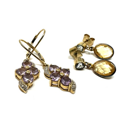 152 - 2 x 9ct gold paired drop earrings inc. citrine, topaz, and amethyst (4.6g)