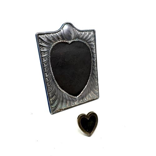21 - 2 silver picture frames small heart shaped 4cm by 4cm large est frame measures approx 19cm by 13cm f... 