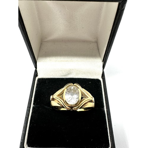 293 - heavy 9ct gold clear stone  ring (7.7g)