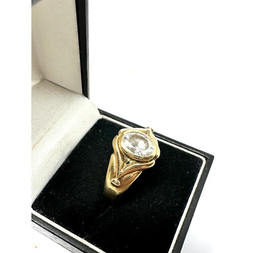 293 - heavy 9ct gold clear stone  ring (7.7g)