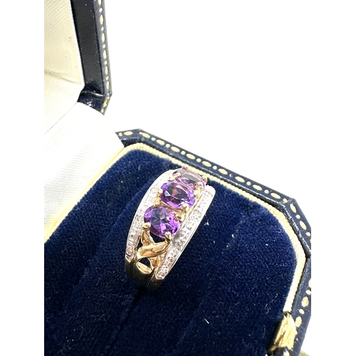 86 - 9ct gold diamond & amethyst ring weight 3.5g