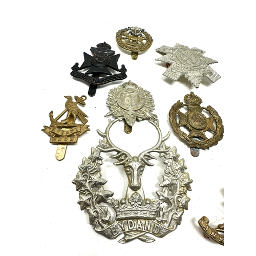 77 - 10 military cap badges