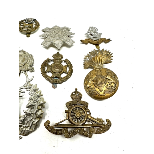 77 - 10 military cap badges