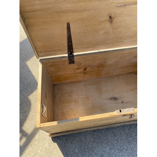 595 - Stripped pine dovetale blanket box measures approximately 14.5 inches tall 35 inches wide 17 inches ... 