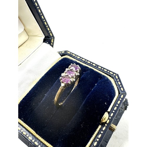 213 - 9ct gold amethyst trilogy ring 2.1g