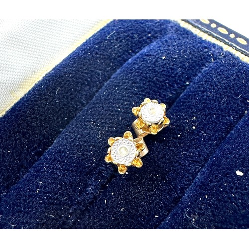 181 - 9ct gold diamond stud earrings (0.3g)