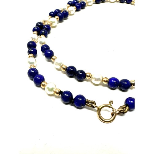 211 - 9ct gold lapis and pearl beaded necklace (9.3g)