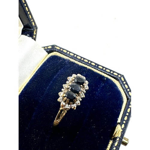 215 - 9ct gold diamond and sapphire  ring (2.2g)