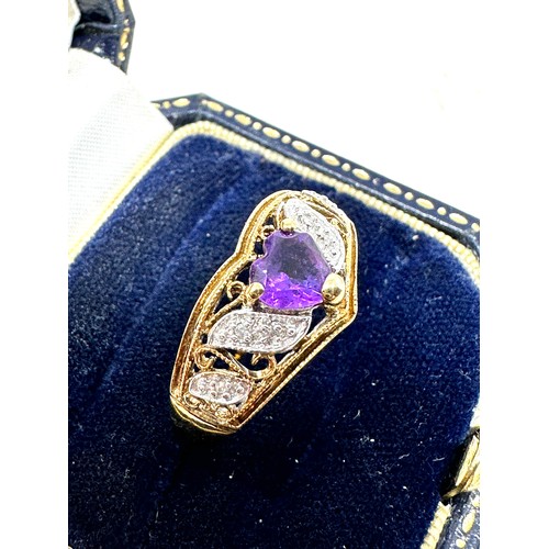 228 - 9ct gold diamond and amethyst  ring (3g)