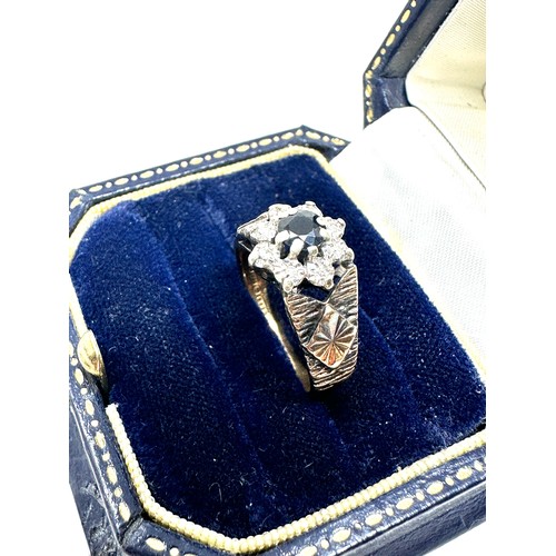 170 - 9ct gold diamond & sapphire floral cluster ring (3.9g)