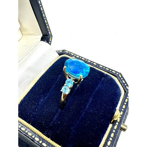 201 - 9ct gold  blue gemstone dress ring (1.5g)