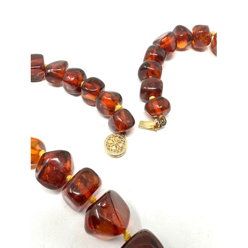 200 - 14ct gold clasp amber necklace (39g)