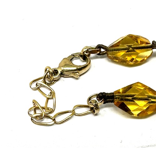 223 - 2 x 9ct gold clasped necklaces inc. citrine, rock quartz and yellow paste (100g)