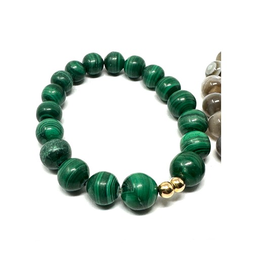 226 - 2 x 9ct gold beaded gemstone bracelets inc. malachite, banded agate (70g)