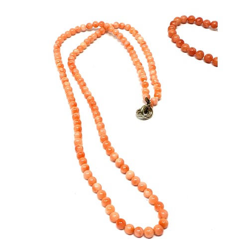 219 - 2 x 9ct gold clasped coral beaded necklaces (17.2g)