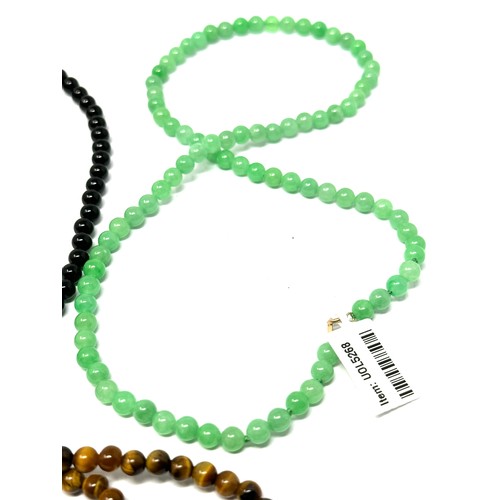 227 - 4 x 9ct gold clasped gemstone beaded necklaces inc. tigers eye, quartzite, black paste (50g)