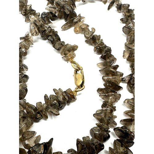 225 - 2 x 9ct gold clasped smokey quartz and aquamarine beaded necklaces (37g)