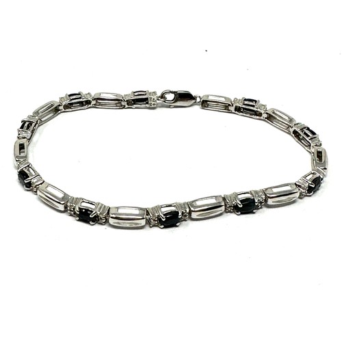 189 - 10ct white gold diamond & sapphire fancy link bracelet (7.1g)