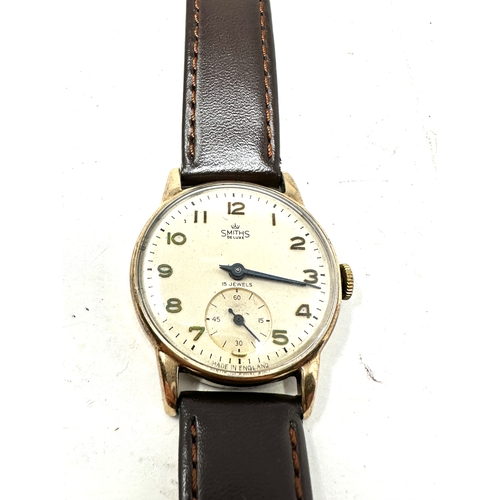 473 - gents vintage 9ct gold Smiths deluxe presentation back watch is ticking