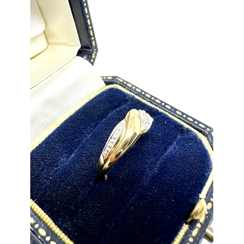 101 - 9ct gold diamond ring 1.4g