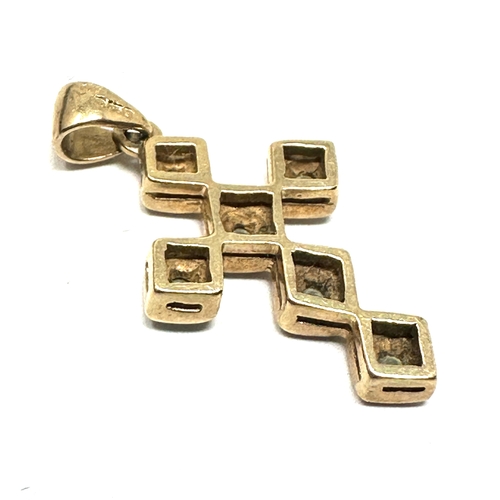 128 - 9ct gold diamond cross pendant 1.6g