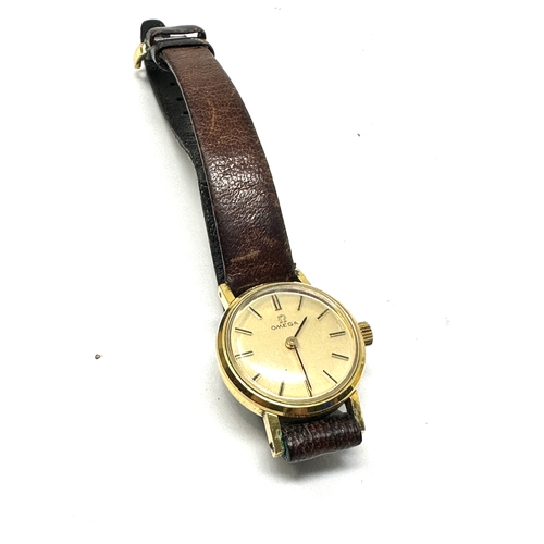 467 - Vintage ladies omega wrist watch and omega leather strap the watch is not ticking