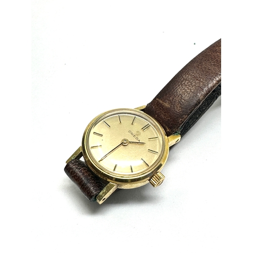 467 - Vintage ladies omega wrist watch and omega leather strap the watch is not ticking