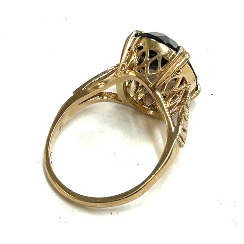 403 - Ladies hallmarked 9ct gold smokey quartz ring, approximate weight 3.6g, ring size K.