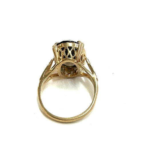 403 - Ladies hallmarked 9ct gold smokey quartz ring, approximate weight 3.6g, ring size K.