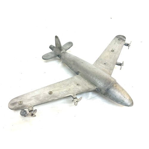 62 - Cast aluminum plane model measures approximately 19 inches depth 25 inches wide