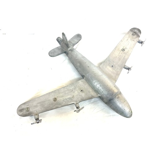 62 - Cast aluminum plane model measures approximately 19 inches depth 25 inches wide