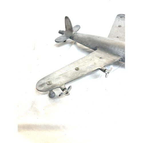 62 - Cast aluminum plane model measures approximately 19 inches depth 25 inches wide