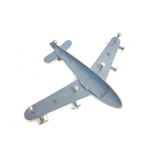 62 - Cast aluminum plane model measures approximately 19 inches depth 25 inches wide