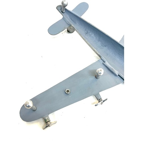 62 - Cast aluminum plane model measures approximately 19 inches depth 25 inches wide