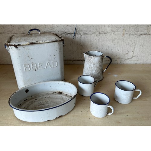 33 - Vintage enamel ware to include bread bin, jug, cups etc