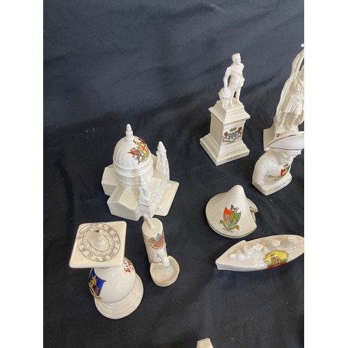 303 - Selection of assorted crested china pieces includes Tent, Army Vehicle, Peeping tom etc