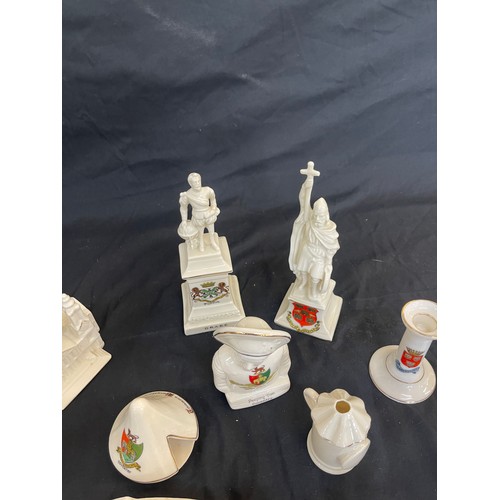 303 - Selection of assorted crested china pieces includes Tent, Army Vehicle, Peeping tom etc