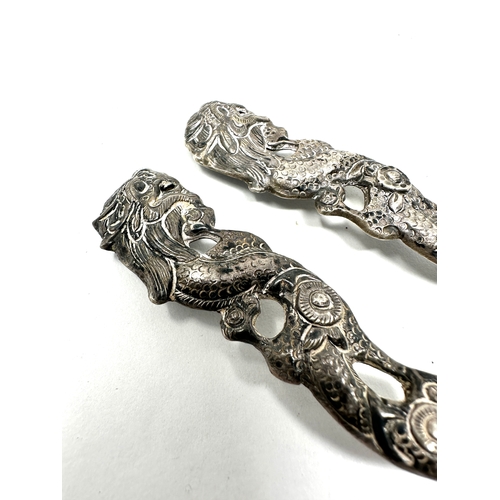 16 - Pair of antique asian silver dragon handle spoons each measure approx 14cm long xrt tested as 800 gr... 